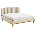 Letto matrimoniale 160 x 200 cm imbottito beige con testiera a pannelli e gambe in legno